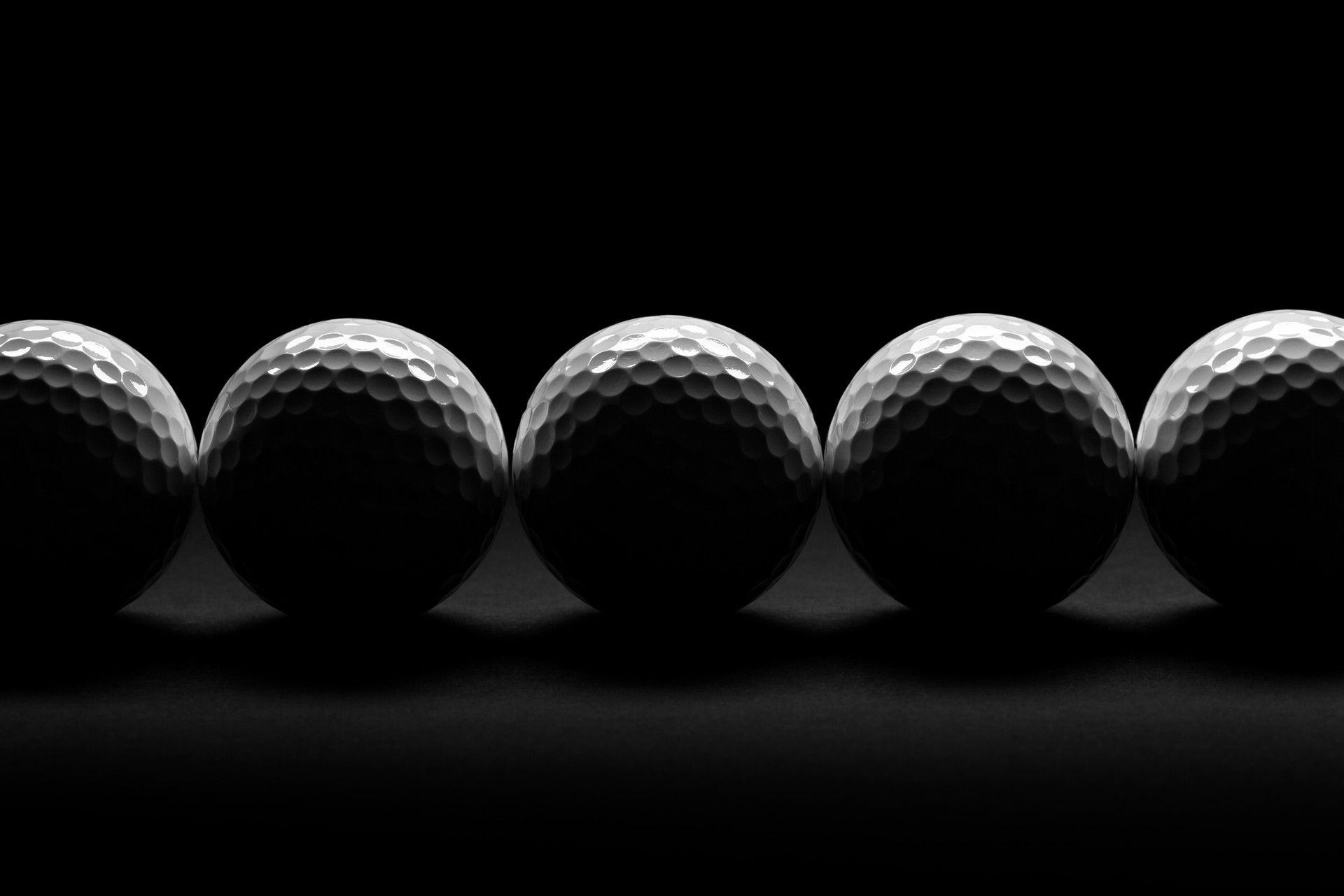 Row of Golf Balls